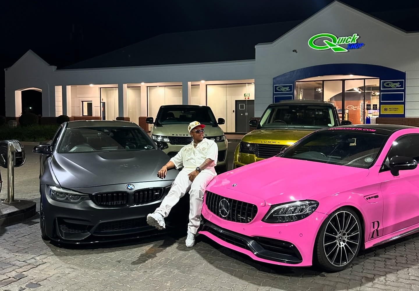 Image of Ghost Hlubi showing off his cars.