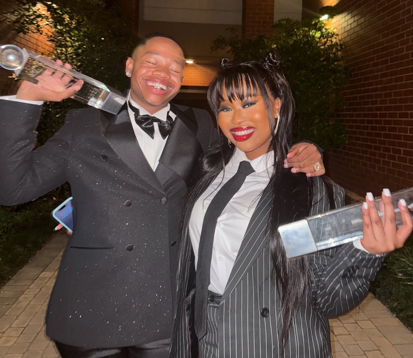 Ghost Hlubi with his girlfriend after receiving awards.