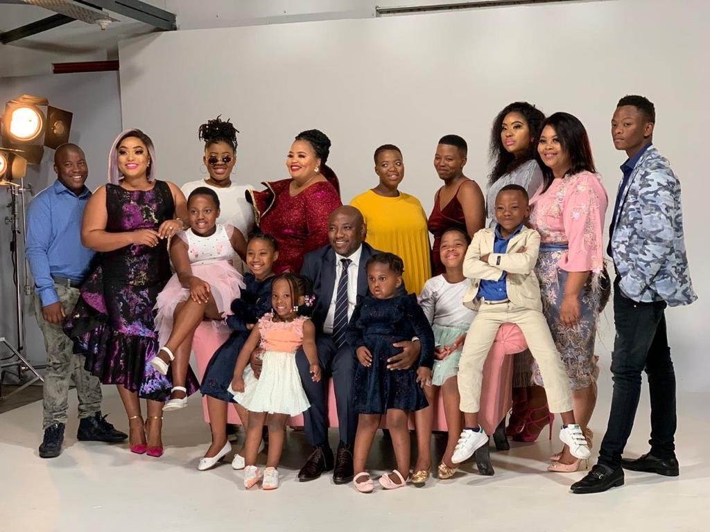 Musa Mseleku with his wives and 11 children